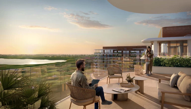 waldorf astoria residences rendering of man sitting at the balcony with sea and golf views