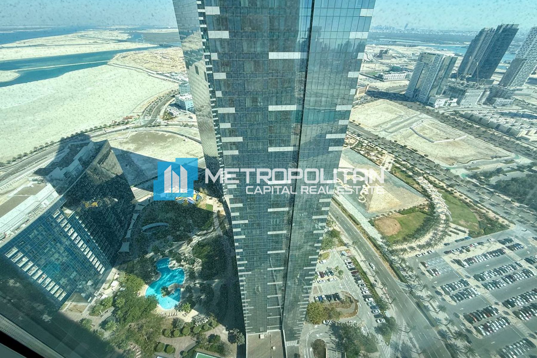 Pool and Canal View | High Floor | Modern 1BR Unit